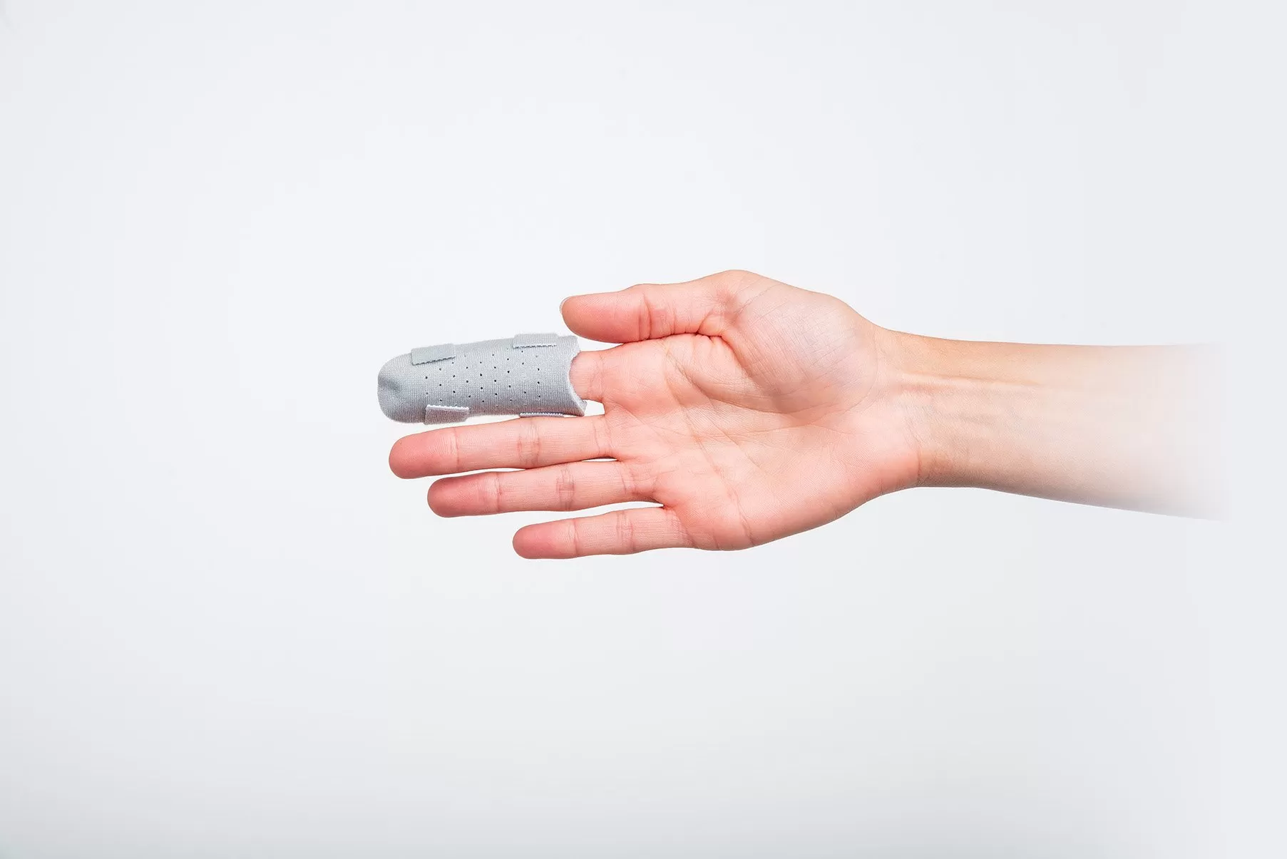 Palmar view of a finger splint supporting the DIP and PIP joints