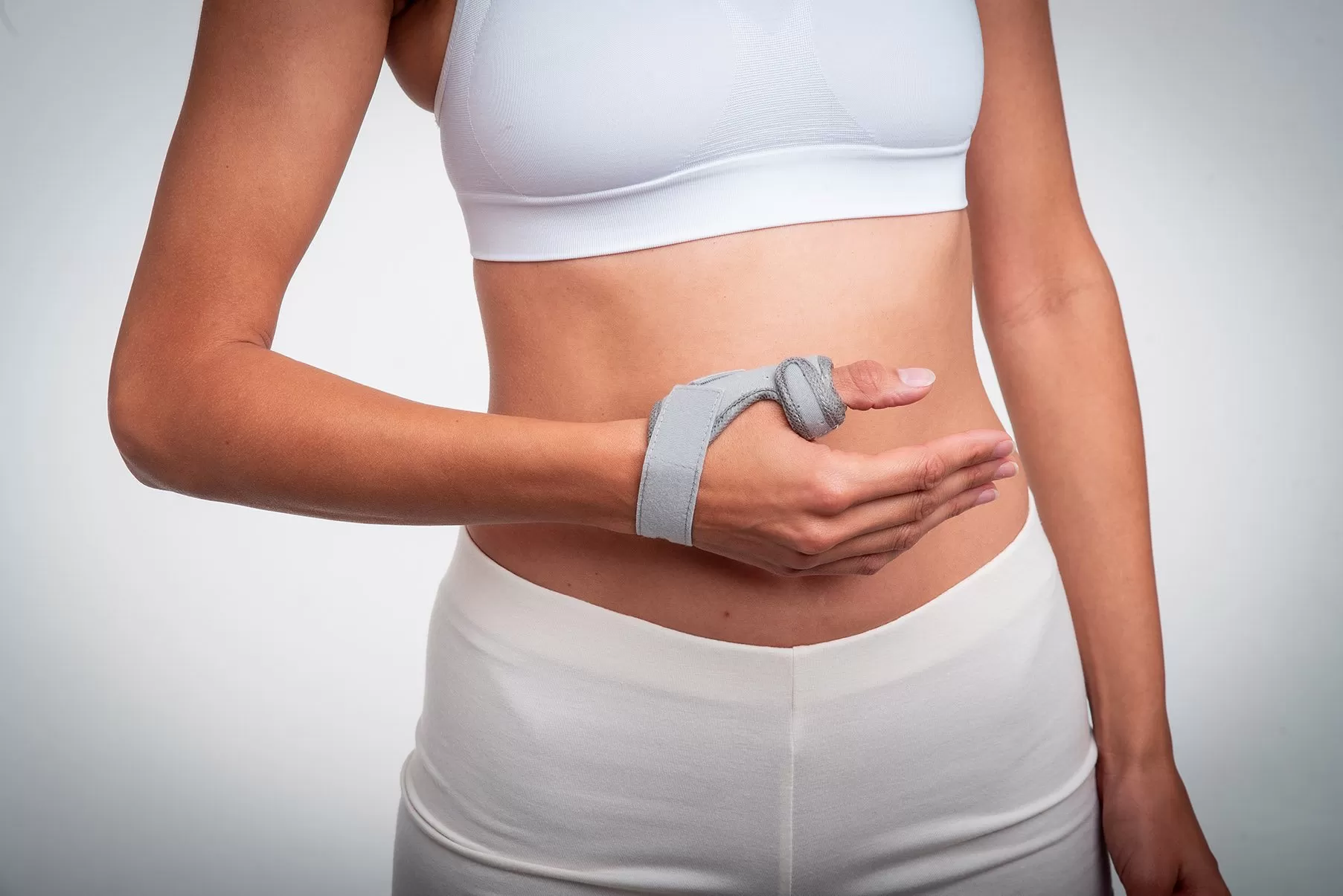 Chrisofix thumb orthosis fitted around the wrist and base of the thumb